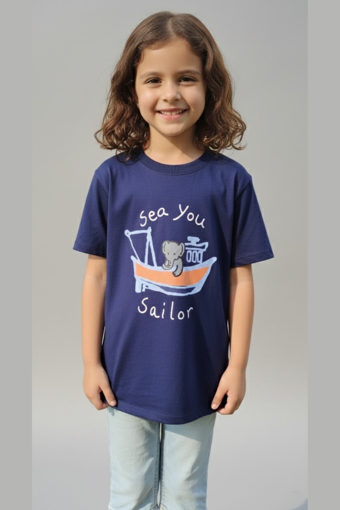 Child wearing a navy blue t-shirt with a graphic design on a plain background