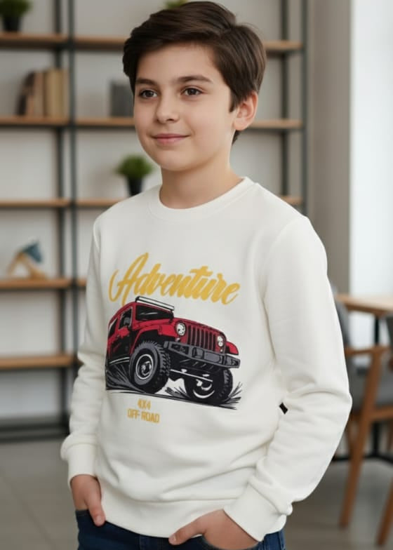 Young boy wearing a white sweatshirt with a red jeep graphic and 'Adventure' text.