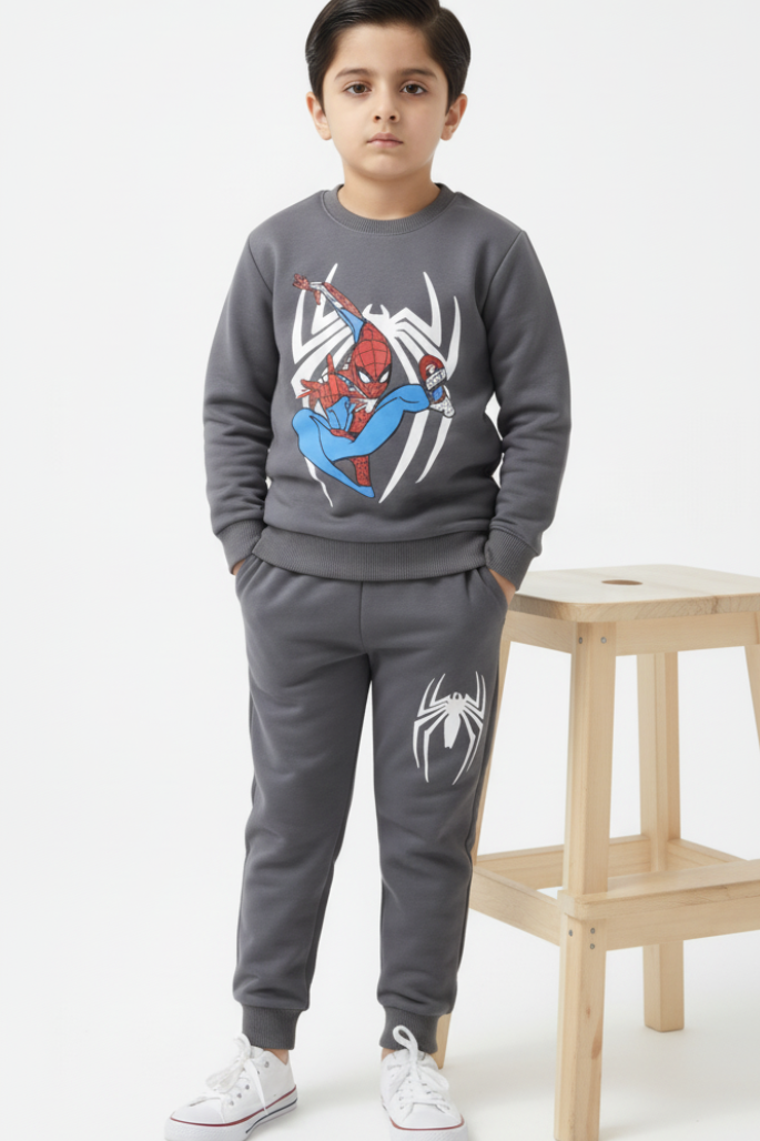 Child wearing a Spider-Man themed gray sweatshirt and pants on a white background