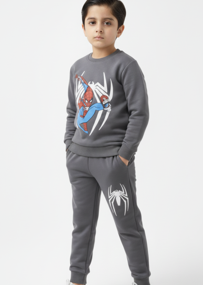 Child wearing a Spider-Man themed gray sweatshirt and pants on a white background