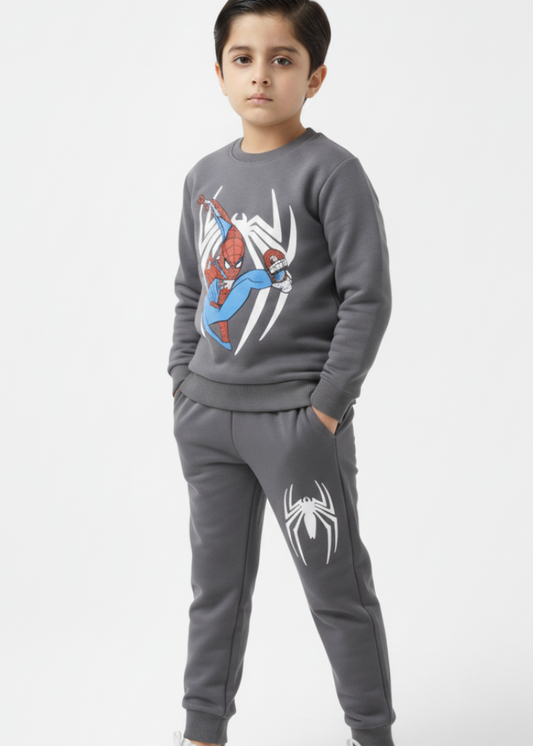 Child wearing a Spider-Man themed gray sweatshirt and pants on a white background