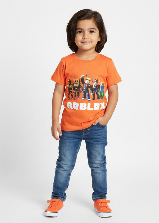 Child wearing an orange Roblox t-shirt and blue jeans on a white background